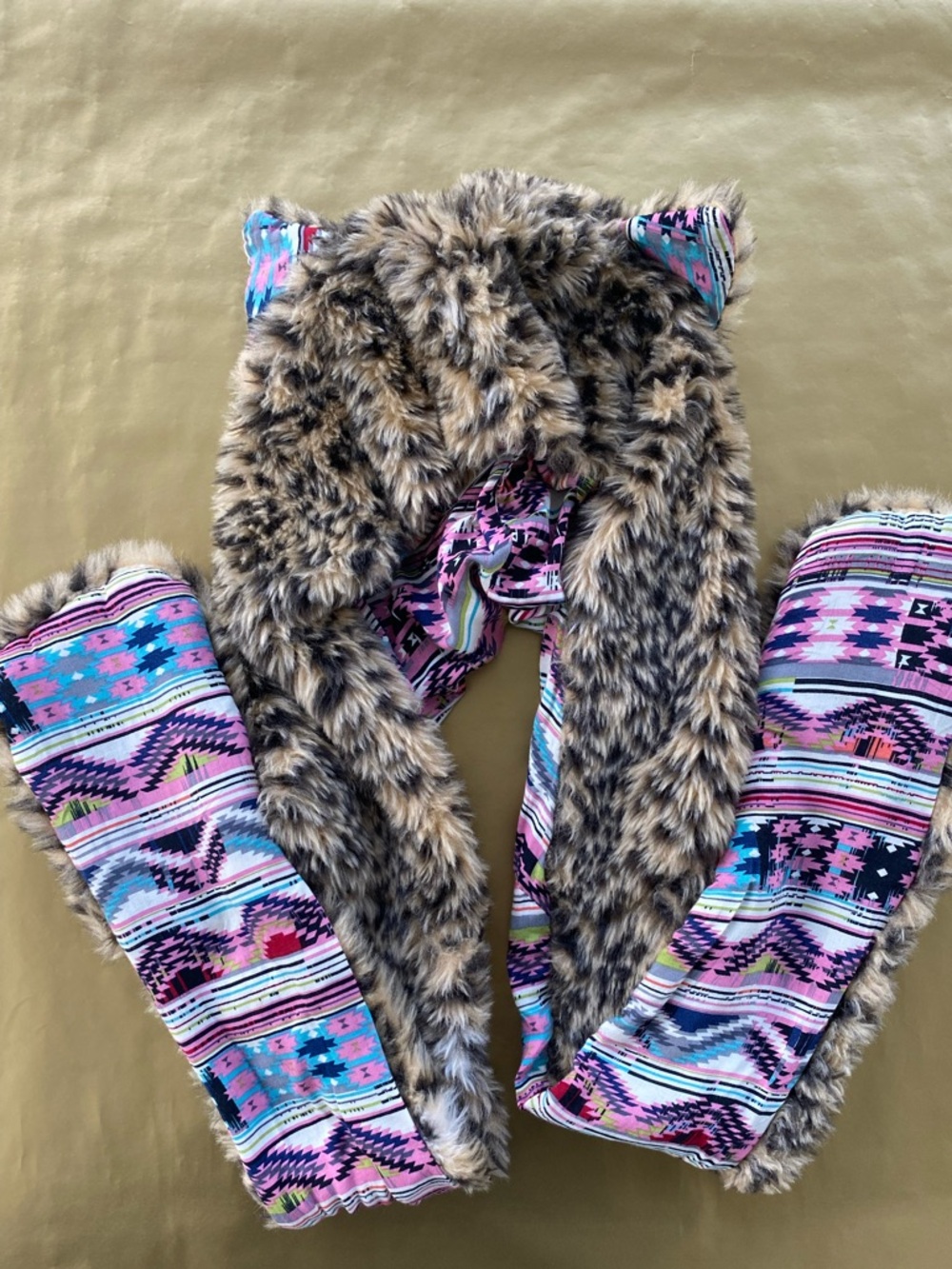Faux fur leaopard hood/scarf with paw pockets